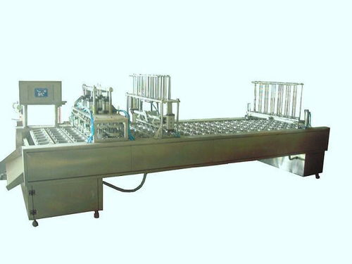 康师傅桶装方便面片盖封口机 伊诺包装机械厂的专业解决方案